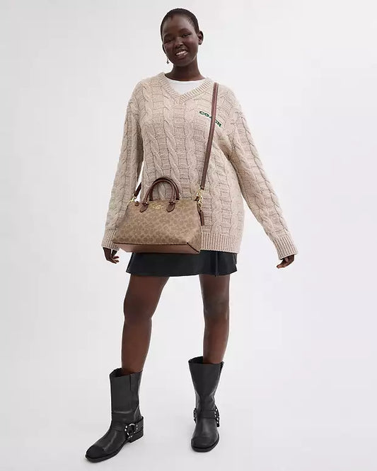 Coach Satchel con diseño de logotipo