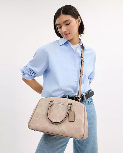 Bolso de mano Coach con etiqueta Coach