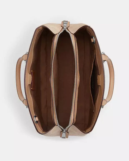 Bolso de mano Coach con etiqueta Coach