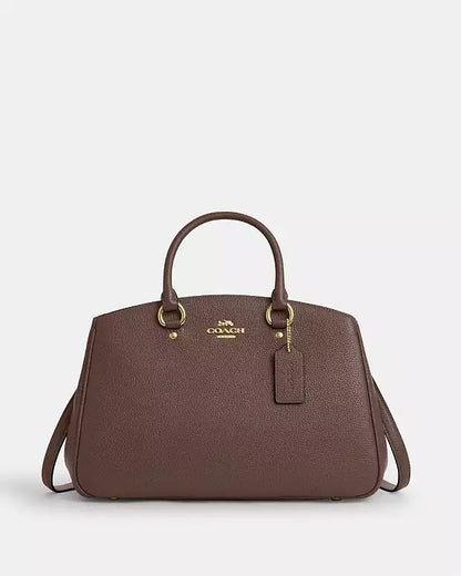 Bolso de mano Coach con etiqueta Coach