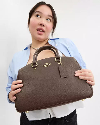 Bolso de mano Coach con etiqueta Coach