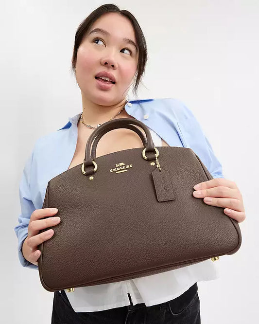 Bolso de mano Coach con etiqueta Coach