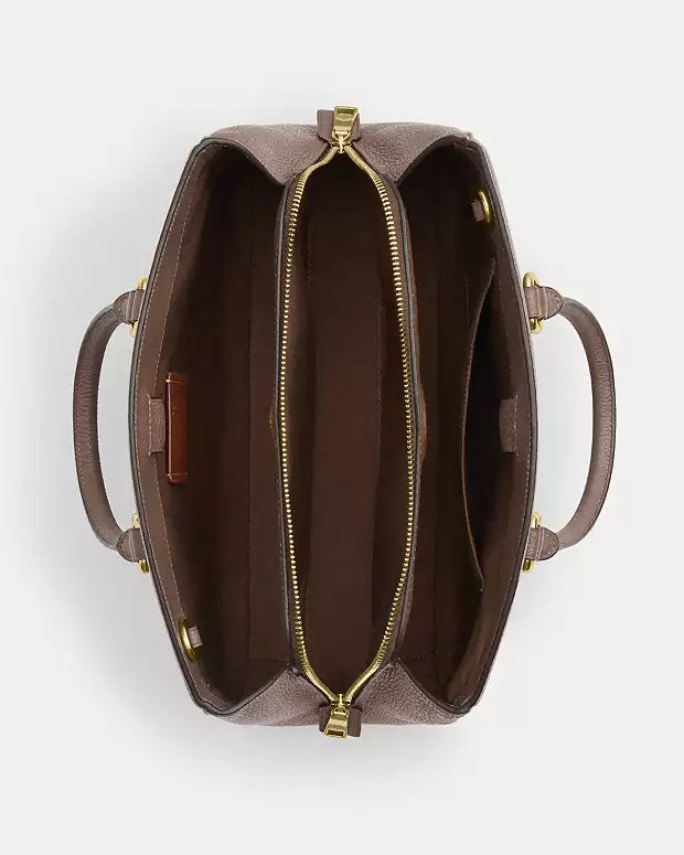 Bolso de mano Coach con etiqueta Coach
