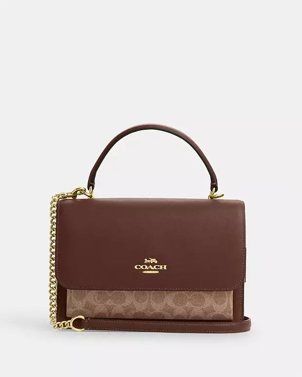 Bolsa Coach con asa superior