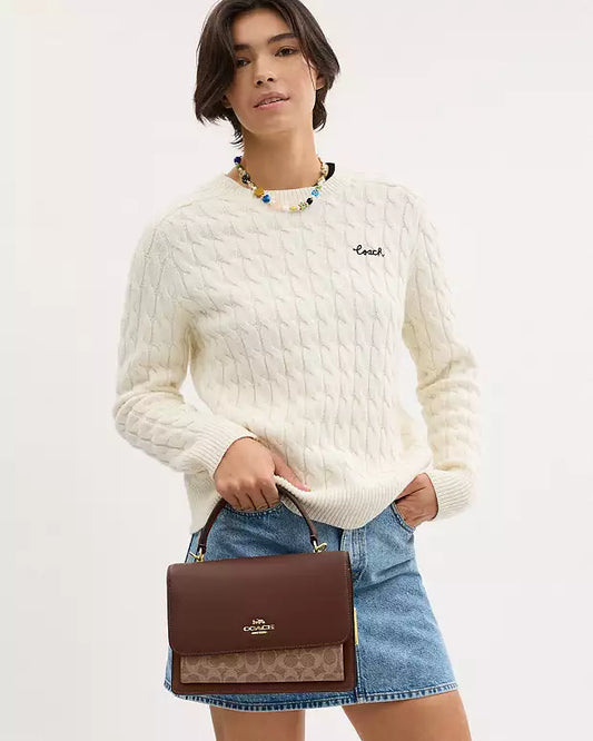 Bolsa Coach con asa superior