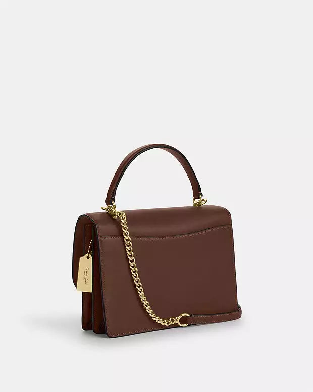 Bolsa Coach con asa superior