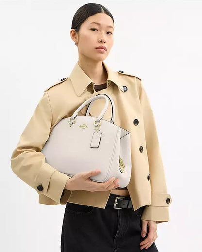 Bolso de mano Coach con etiqueta Coach