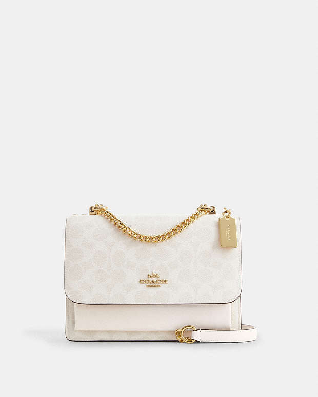 Bolsa Coach con asa superior